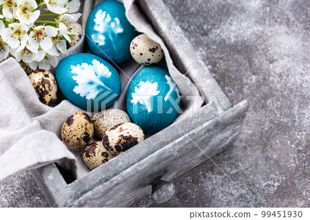 Easter blue eggs painted of natural dye Easter blue eggs painted of natural dye 99451930