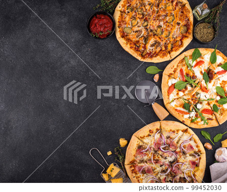 Assortment of various type of Italian pizza 99452030