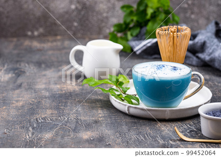 Blue matcha latte with milk Blue matcha latte with milk 99452064