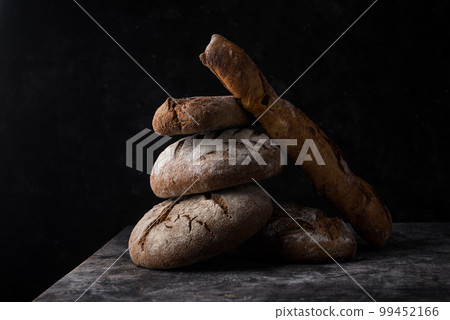 Fresh homemade bread with a crispy crust Fresh homemade bread with a crispy crust 99452166