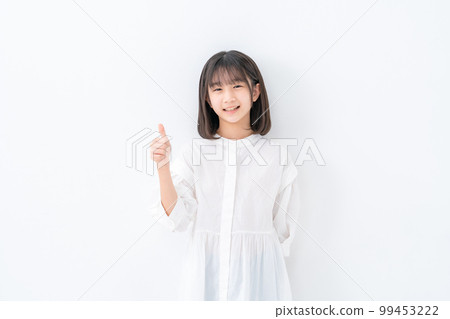 Girl thumbs up white background Girl thumbs up white background 99453222