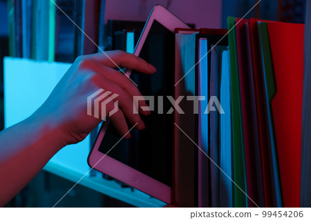 Concept of books vs technology, old search for information vs modern search for information 99454206