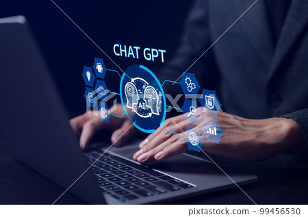 ChatGPT Chat with AI or Artificial Intelligence technology. businessman using a laptop computer chatting with an intelligent artificial intelligence. Developed by OpenAI. Futuristic technology. 99456530