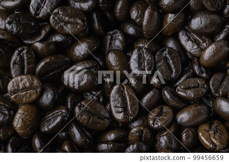 Background of roasted coffee beans. Photo Macro close up. 99456659