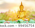 Makha Asanaha Visakha Bucha Day Golden Buddha image. Background of Bodhi leaves with shining light. Soft image and smooth focus style 99456754