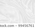 white silk textured cloth background,Closeup of rippled satin fabric with soft waves. 99456761