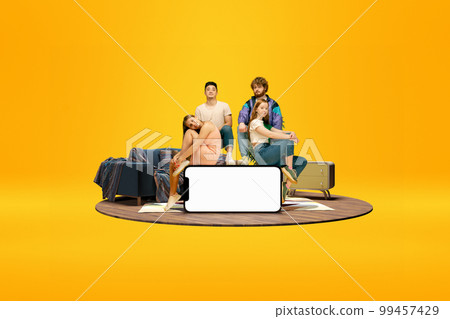 Friends, young man and girls near giant 3D model of mobile phone with empty screen for text, ad. Online match, shopping. Mockup for design, logo. 99457429