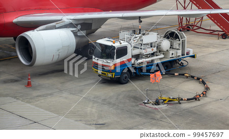 Aircraft refueling by high pressure fuel supply truck.  99457697