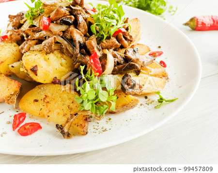 Potatoes with champignons Potatoes with champignons 99457809