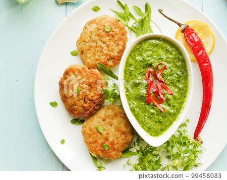 Cutlets and sauce Cutlets and sauce 99458083