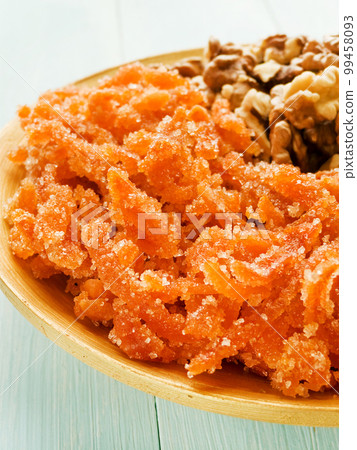 Walnuts and candied fruits 99458093