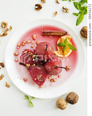 Poached mulled pears 99458272