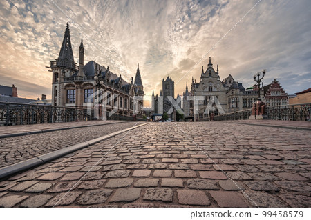 Ghent Belgium, city skyline night at St Michael's Bridge (Sint-Michielsbrug) with Leie River and Korenlei 99458579