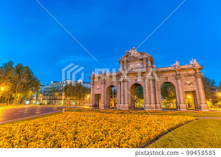 Madrid Spain, night city skyline at Puerta de Alcala 99458585