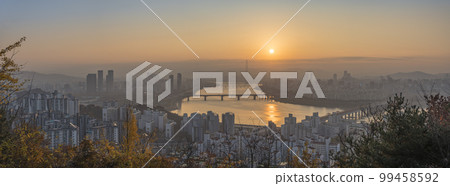 Seoul South Korea, panorama city skyline sunrise at Han River view from Maebong Mountain Park in autumn Seoul South Korea, panorama city skyline sunrise at Han River view from Maebong Mountain Park in autumn 99458592