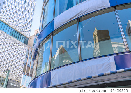 Tokyo cityscape in Japan The symbol of Ginza disappears. The cityscape of Ginza reflected in the window glass of the closed San-ai ... a big change = 20th 99459203