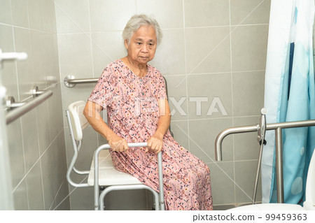 Asian senior or elderly old lady woman patient use toilet bathroom handle security in nursing hospital, healthy strong medical concept. Asian senior or elderly old lady woman patient use toilet bathroom handle security in nursing hospital, healthy strong medical concept. 99459363