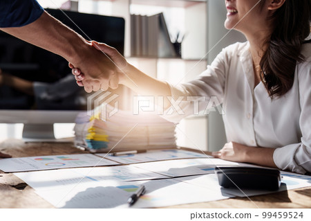 Business partnership meeting concept. Image business people handshake. Successful business person handshaking after good deal. 99459524
