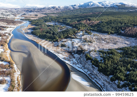 Aerial view of snow covered Gweebarra River between Doochary and Lettermacaward in Donegal - Ireland - The site of the new Cloughercor wind farm in the background Aerial view of snow covered Gweebarra River between Doochary and Lettermacaward in Donegal - Ireland - The site of the new Cloughercor wind farm in the background 99459625