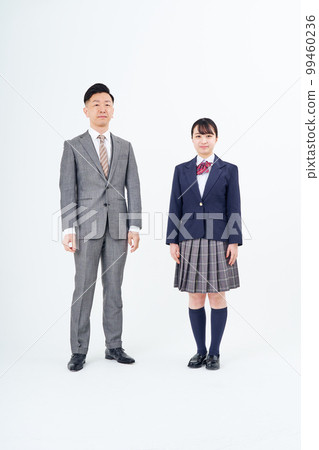 A man in a suit and a high school girl 99460236