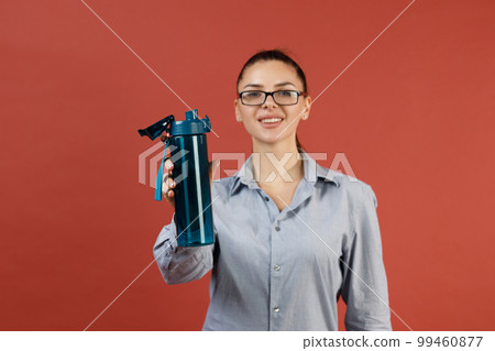 Successful young modern businesswoman with bottle of water at office while working, Business, work, woman and sport fitness workout exercise concept 99460877