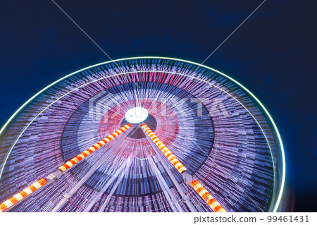 Ferris wheel in amusement park outdoor at night Thailand 99461431