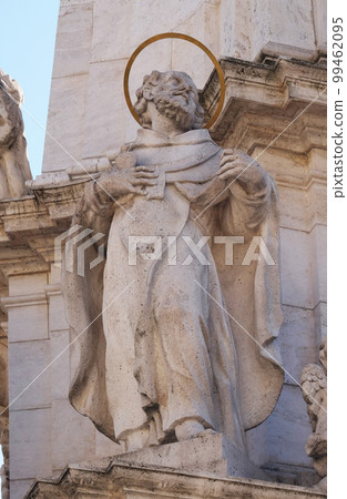 Statue of Saint Augustine of Hippo, detail of Holy Trinity plague column in front of Matthias Church in Budapest, Hungary Statue of Saint Augustine of Hippo, detail of Holy Trinity plague column in front of Matthias Church in Budapest, Hungary 99462095