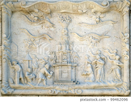 Relief of a votive memorial construction at Holy Trinity plague column in front of Matthias Church in Budapest, Hungary Relief of a votive memorial construction at Holy Trinity plague column in front of Matthias Church in Budapest, Hungary 99462096