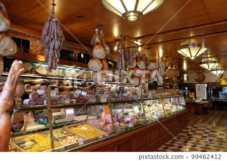 Local shop. Region Emilia-Romagna is more famous for its meat pork-based products, like parma prosciutto, mortadella in Bologna, Italy. Local shop. Region Emilia-Romagna is more famous for its meat pork-based products, like parma prosciutto, mortadella in Bologna, Italy. 99462412