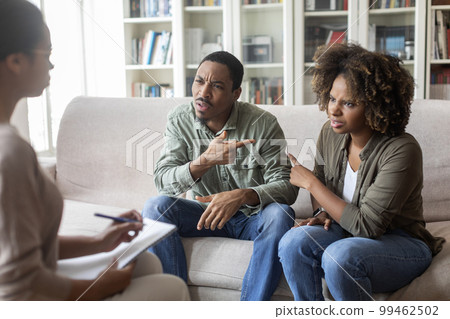 African american spouses blaming each other while visiting psychologist 99462502