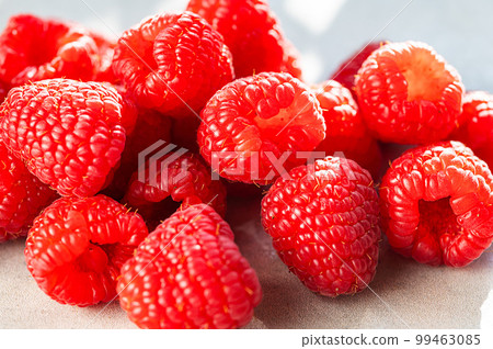 Macro raspberry, fresh red berry closeup. 99463085