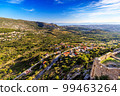 Croatia, Dalmatia, aerial view from the Klis Fortress near Split to the mountains, the nearby town and the sea in the distance. 99463264
