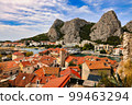 Croatia, Dalmatia, town of Omis,  View of the mountains, old town, river Cetina. 99463294