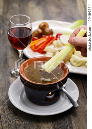 Bagna cauda (dipping celery) 99464234