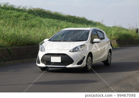 Compact car drive road driving 99467098