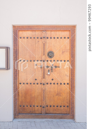 Old gate in the old district of Sharjah city. Place for text 99467293