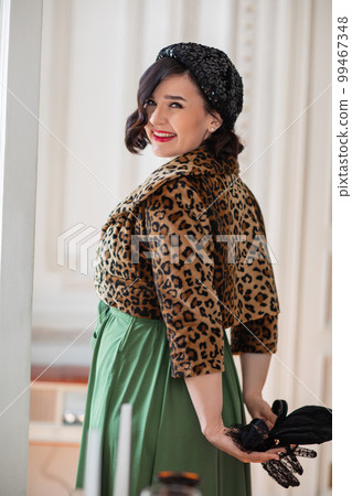 beautiful and happy brunette in retro clothes, beret and with a handbag. beautiful and happy brunette in retro clothes, beret and with a handbag. 99467348