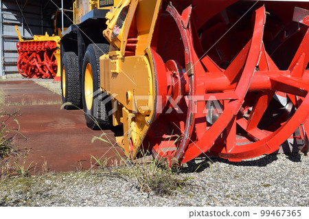 Snowplow waiting in a snowy country Snowplow waiting in a snowy country 99467365