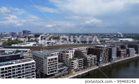Modern buildings in the Harbour City district in Hamburg at the port - aerial view 99468148