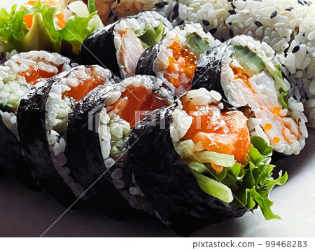 Food and diet, japanese sushi in a restaurant, asian cuisine as meal for lunch or dinner, tasty recipe idea Food and diet, japanese sushi in a restaurant, asian cuisine as meal for lunch or dinner, tasty recipe idea 99468283