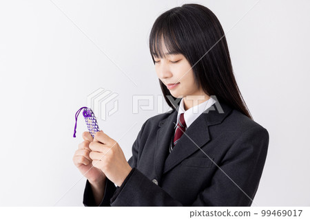 Amulet A young woman praying to the gods 99469017