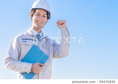 An engineer with a guts pose in the sky An engineer with a guts pose in the sky 99470899