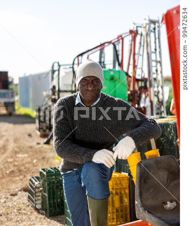 Portrait of worker standing outdoors Portrait of worker standing outdoors 99472634