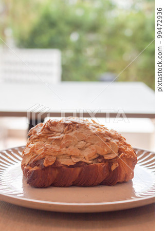 Freshly baked French croissant served in coffee shop Freshly baked French croissant served in coffee shop 99472936