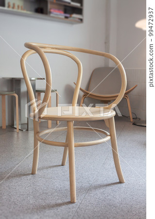 Wooden chair decorated in coffee shop Wooden chair decorated in coffee shop 99472937