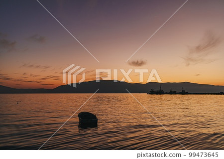 Clam sunset ocean in Vlore city, Albania. 99473645