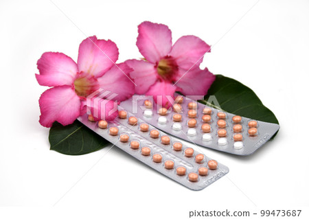 21 tablets and 28 tablets oral contraceptive pill on white background. 99473687