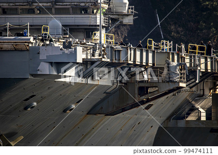 The U.S. Navy nuclear-powered aircraft carrier Ronald Reagan anchored at Yokosuka Air Base in Yokosuka City, Kanagawa Prefecture, under repair and maintenance. 99474111
