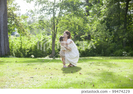 pregnant mom and daughter 99474229