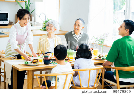 Three generations family to eat Three generations family to eat 99479809